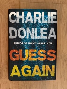 Guess Again Hardcover Book - Blue/Orange/Yellow Cover